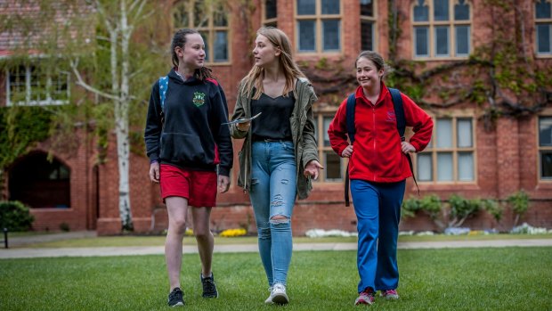 The first female students on Canberra Boys Grammar School campus in preparation for 2017. From left: Charlize King (year 7), Annabelle Lester (year 11), and Frida Meares (year 7).
