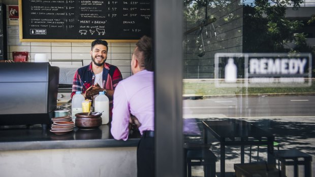 Canberra public servants are likely to spend about $45 each working day in shops and cafes, like Belconnen's Remedy, co-owned by Moey Khodr.