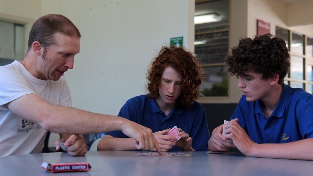 Upwey High students Aviv Dolan, centre, and Rory-Clay Edwards have improved their memories and academic performance with mnemonics techniques taught to them by teacher Dan Mayes. Photo: Sherryn Groch