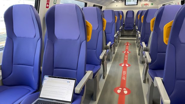 Second class carriages have blue vinyl seats in a 2-2 layout, plus a single seat in the last row. 