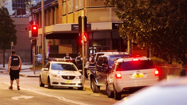 Police cars block the area around Charles and Hassall Streets in Parramatta.