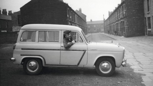Ringo in his first car, a Standard Vanguard, bought from another drummer, Johnny Hutch, for £75

