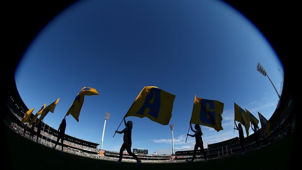 Way out west: Eagles flags are paraded around the boundary before the round 16 match.
