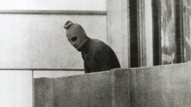 One of the defining images of the Munich hostage siege: one of the Palestinian terrorists.