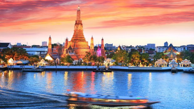 The iconic Wat Arun, Thailand, at  sunset.
