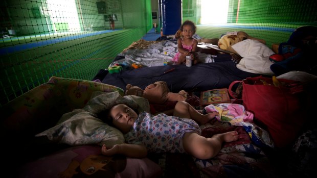 Ipswich residents take shelter in an evacuation centre in 2011.