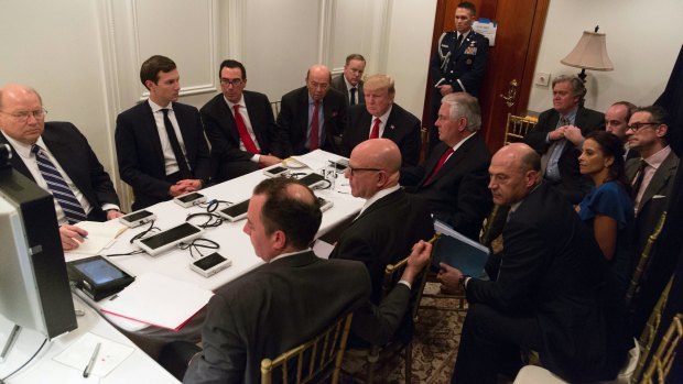 Donald Trump and members of his administration are briefed on the strike on an air base in Syria.
