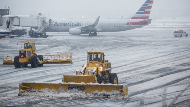 The tarmac is cleared at La Guardia Airport in New York.