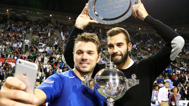 Wawrinka and Paire take a selfie after the final.