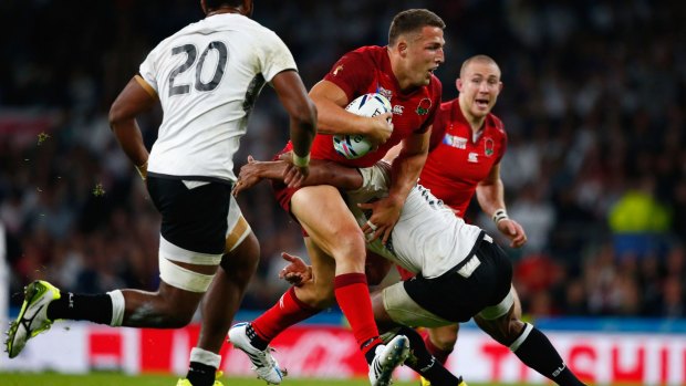 Rabbitoh on the rampage: Former South Sydney forward Sam Burgess played strongly for England against Fiji.