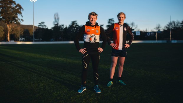 AFL prospect Jack Powell [right] helped Ainslie clinch back-to-back premierships alongside his brother Tom. 