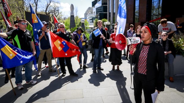 No Business in Abuse executive director Shen Narayanasamy speaks at a rally outside Transfield's head office last month about human rights violations in immigration detention centres.