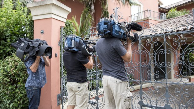 Media outside Communications Minister Malcolm Turnbull's Sydney home on Saturday morning.