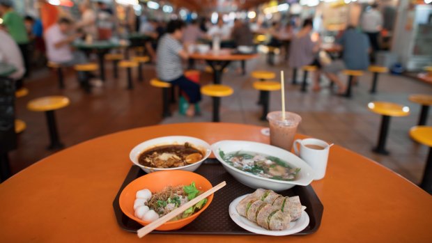 Dine at the Maxwell Road Hawker Centre.