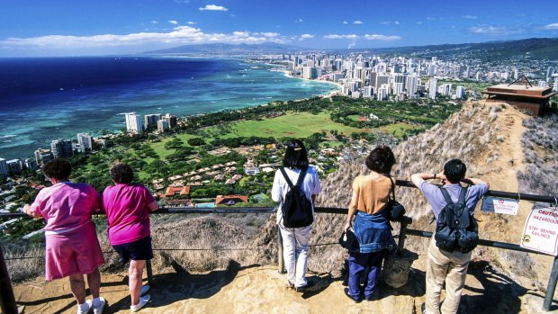 Hikers at the summit of Diamond Head crater.
