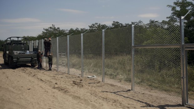 Construction of the fence began on Monday despite heavy criticism from other European countries.
