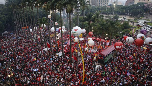 Demonstrators march in support of Brazil's President Dilma Rousseff and former president Luiz Inacio Lula da Silva in Sao Paulo on Thursday.