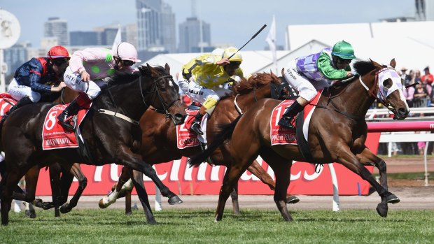 Explosive: Michelle Payne (green cap) riding Prince of Penzance defeats Frankie Dettori (pink) riding Max Dynamite.