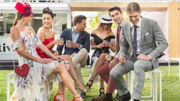 Models take a breather at The Park, where the Melbourne Cup carnival was officially launched.