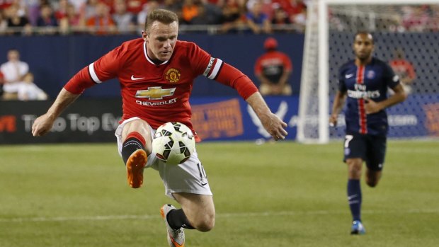 Manchester United forward Wayne Rooney in action against Paris Saint-Germain.