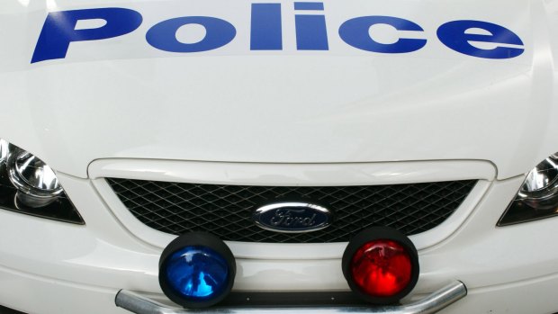 Police are hunting a man who held up two stores around Perth with a syringe.