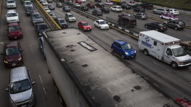 Rush-hour traffic on the Circuito Interior, a freeway in Mexico City, where some commutes can last for hours.