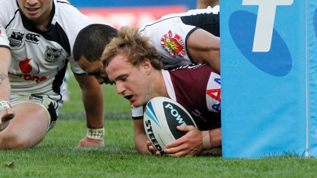 Emphatic: Daly Cherry-Evans scores in Manly's win over the Warriors in the 2011 decider.