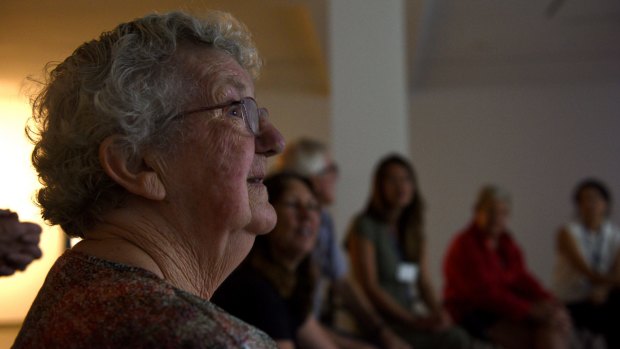 Maureen Neill watches video art at the MCA as part of the Artful program for people with dementia. 