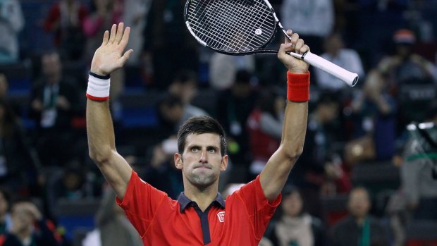 Novak Djokovic celebrates his semi-final win.
