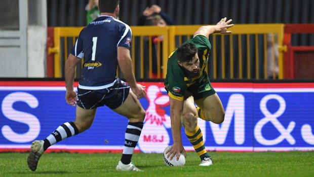 Australia's Josh Mansour scores a try during the Four Nations last year.