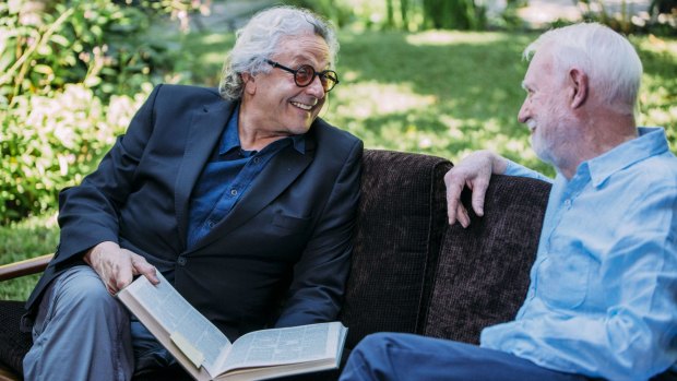 Film director George Miller, with David Stratton in the new film about Stratton's life and career that features a star-studded line-up of interviewees.
