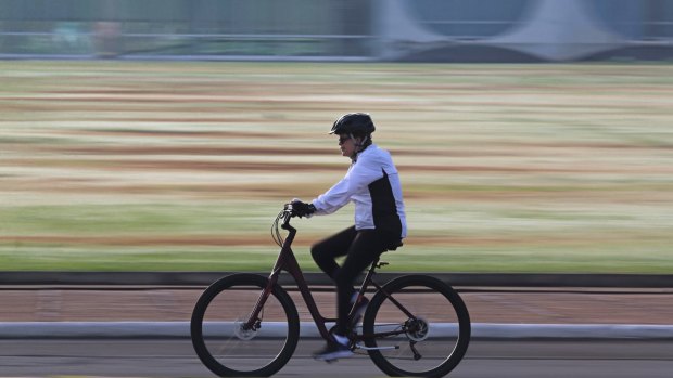 Dilma Rousseff on her bicycle outside the official residence Alvorada Palace, in Brasilia, last month.
