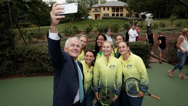 Prime Minister Malcolm Turnbull with the Australian Federation Cup tennis team on Friday. 
