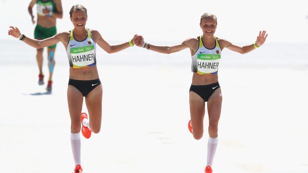 The Hahner twins have been criticised for holding hands in the final leg of the marathon. 