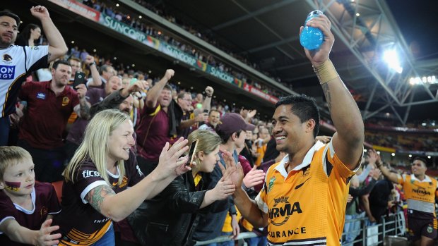 Brisbane's Anthony Milford celebrates with fans after their preliminary final victory.