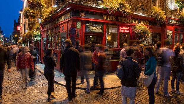 Dublin famed Temple Bar pub district at night.