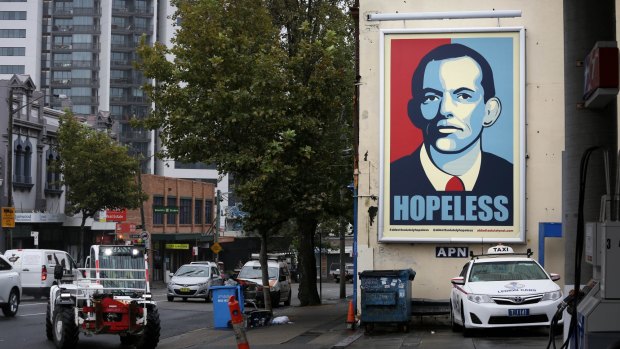 A Tony Abbott 'hopeless' poster at a service station on Regent St, Chippendale.
