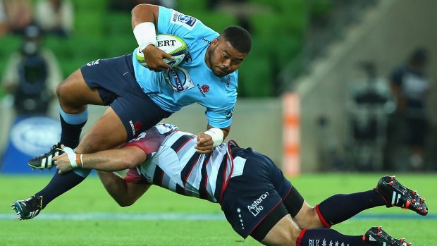 Fast learner: Tolu Latu of the Waratahs in Super Rugby action against the Rebels. 