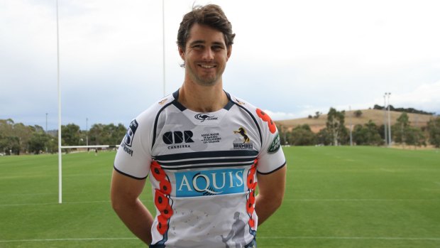 Brumbies lock Sam Carter models the club's Anzac Day jersey.