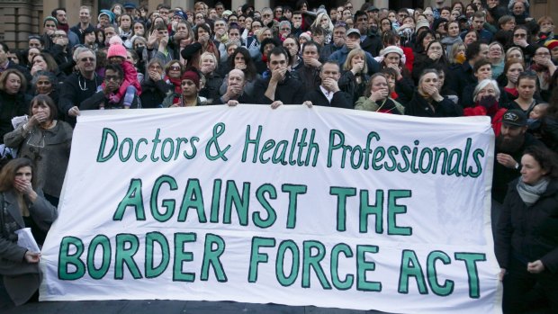 Doctors and Health Professionals protesting new laws that threaten them with jail if they reveal conditions in detention centres.