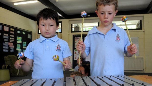 Students William Carroll and Alec Bell perform at Canberra Grammar School's southside campus.