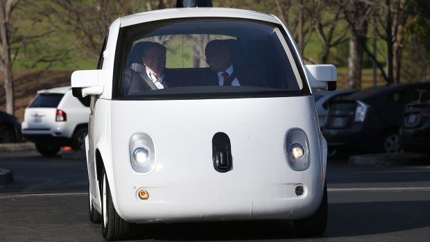 Look, no hands: Google is expected to partner with Ford to make autonomous vehicles, such as its less than sleek "Toaster".
