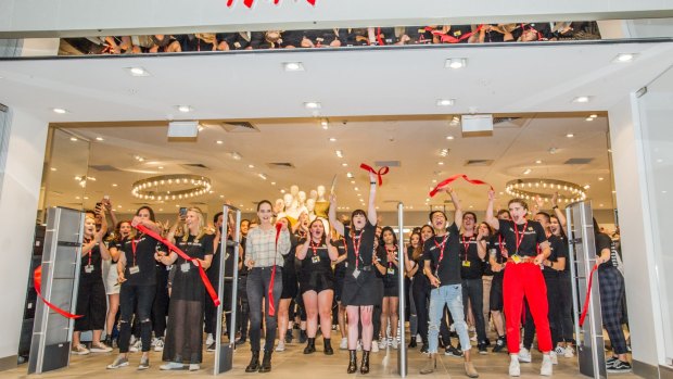 The ribbon is cut, officially opening Canberra's first H&M store at Canberra Centre.