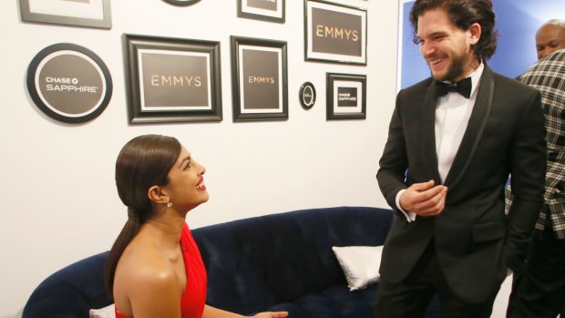 Priyanka Chopra (left) and Kit Harington backstage at the Emmy Awards.