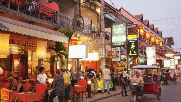 Restaurants on Pub Street, Siem Reap, offer a welcome cheap meal and cold beer after a day's cycling.