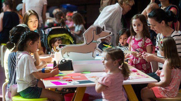Children getting crafty at the free NGV summer kids' festival.