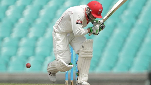 Tragic blow: Phil Hughes after being struck at the SCG on Tuesday.