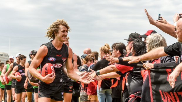 Dyson Heppell is welcomed back by fans after training.