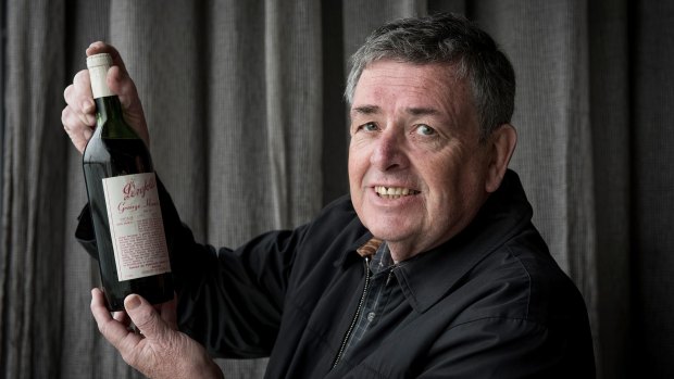 Alan Porter with his bottle of 1971 Penfolds Grange being tested at Carousel Restaurant in Albert Park.