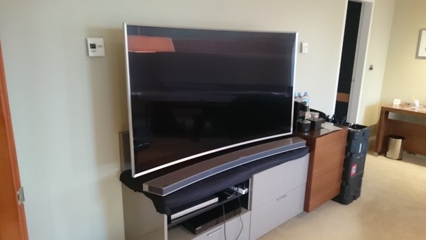 The 65-inch JS9500 in more of a real-world setting. Notice how the reflection smears across the screen, which can be a problem for curved TVs depending on your lounge room.